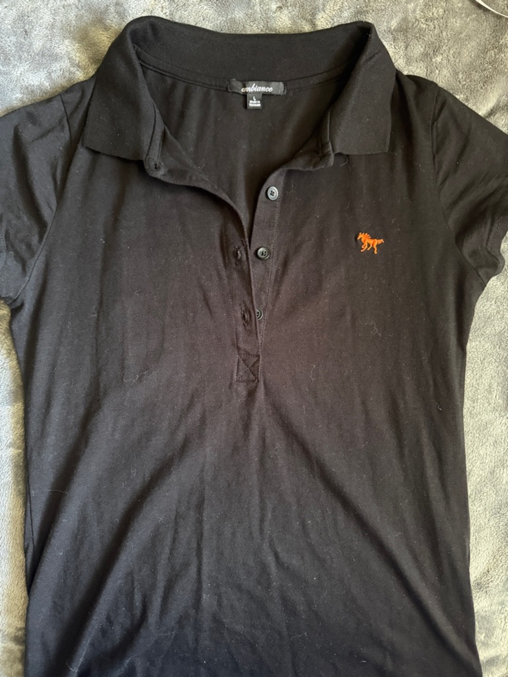 Black Polo Top with Orange Logo